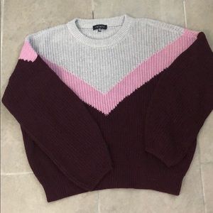 Maroon pink and gray sweater.